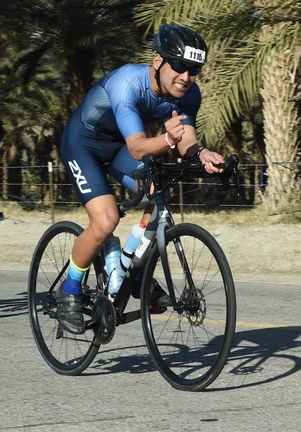 Jordan biking in a race