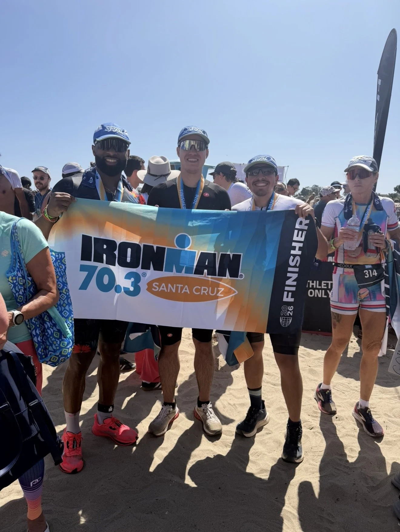 Lamar celebrating finishing IM 70.3 Santa Cruz