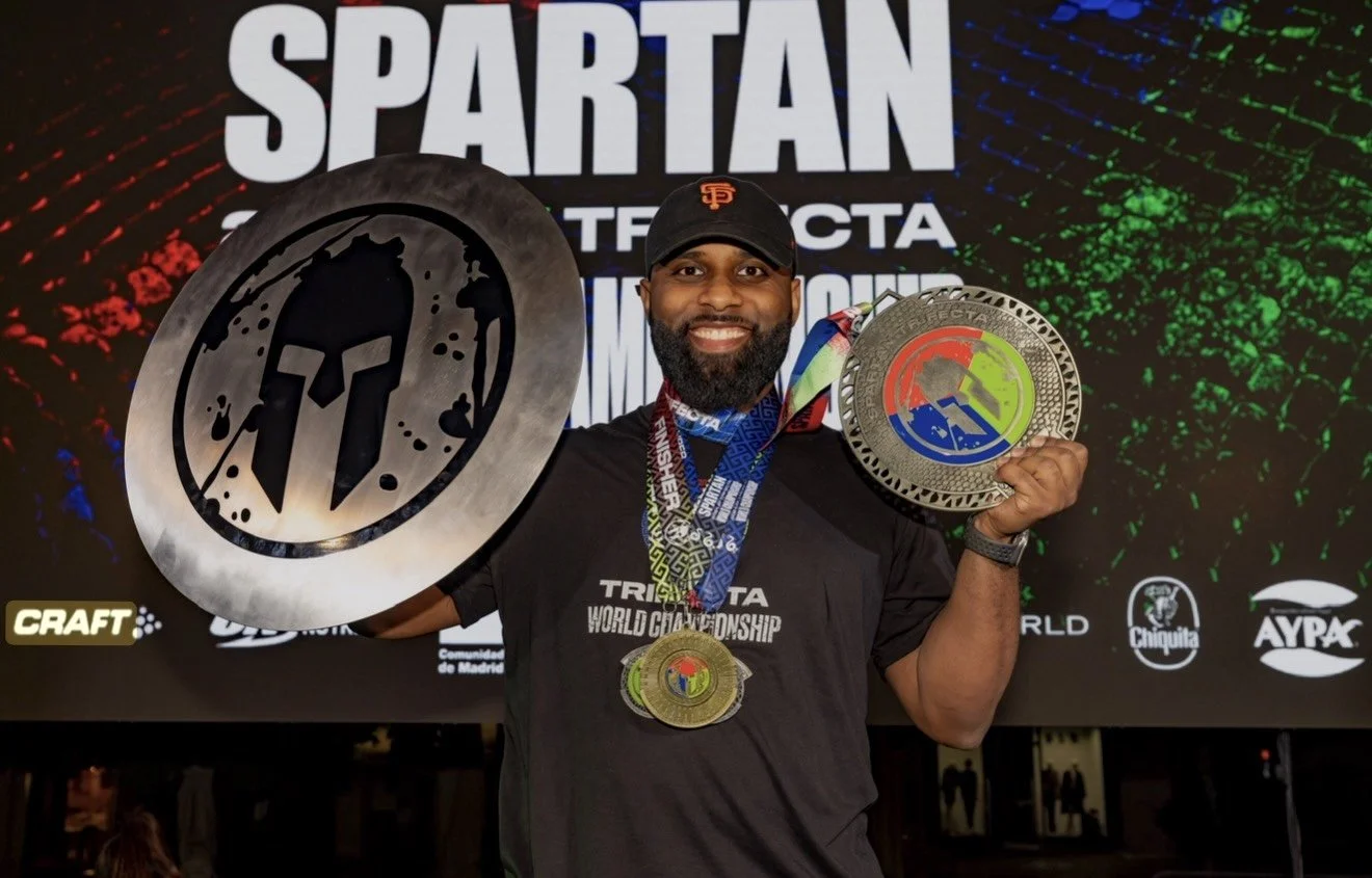 Lamar celebrating finishing a Spartan race